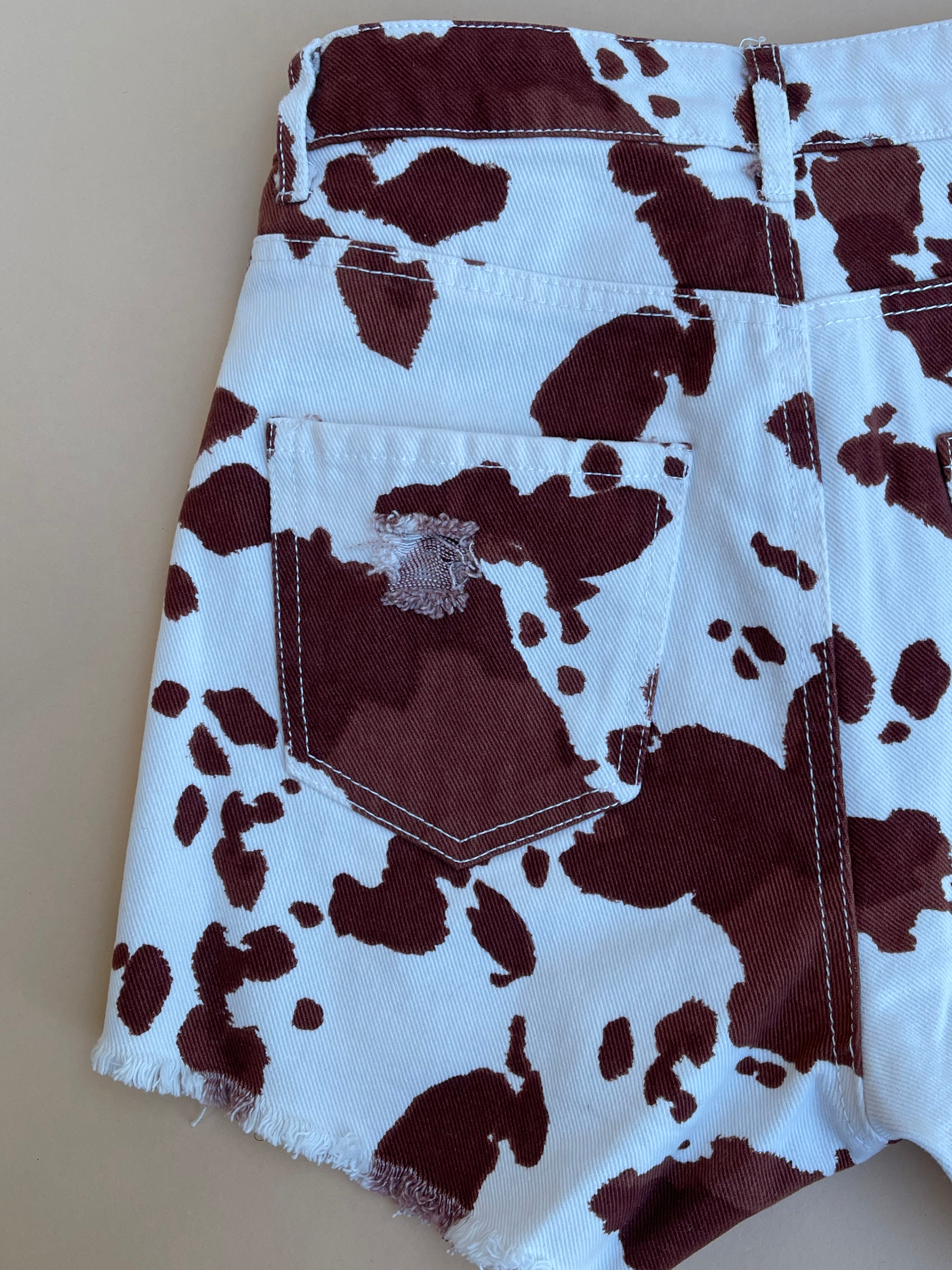 Joanna High Waist Cow Print Mini Shorts